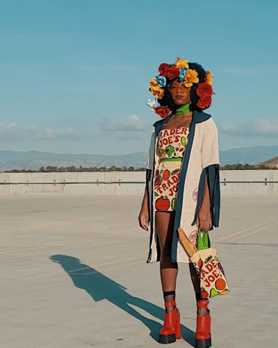 Arielle Sidney poses in her outfit made from Trader Joe's bags