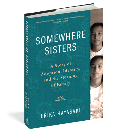 A picture of a blue book called "Somewhere Sisters," by Erika Hayasaki