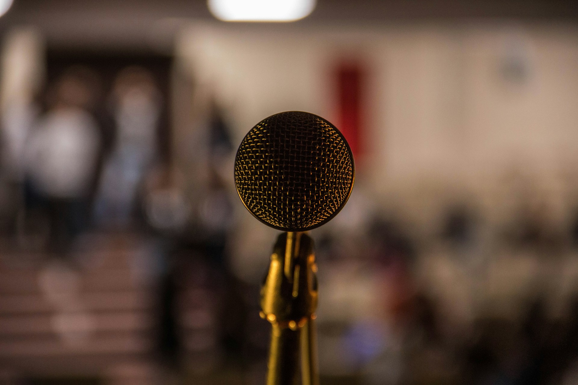 brass microphone against blurred background