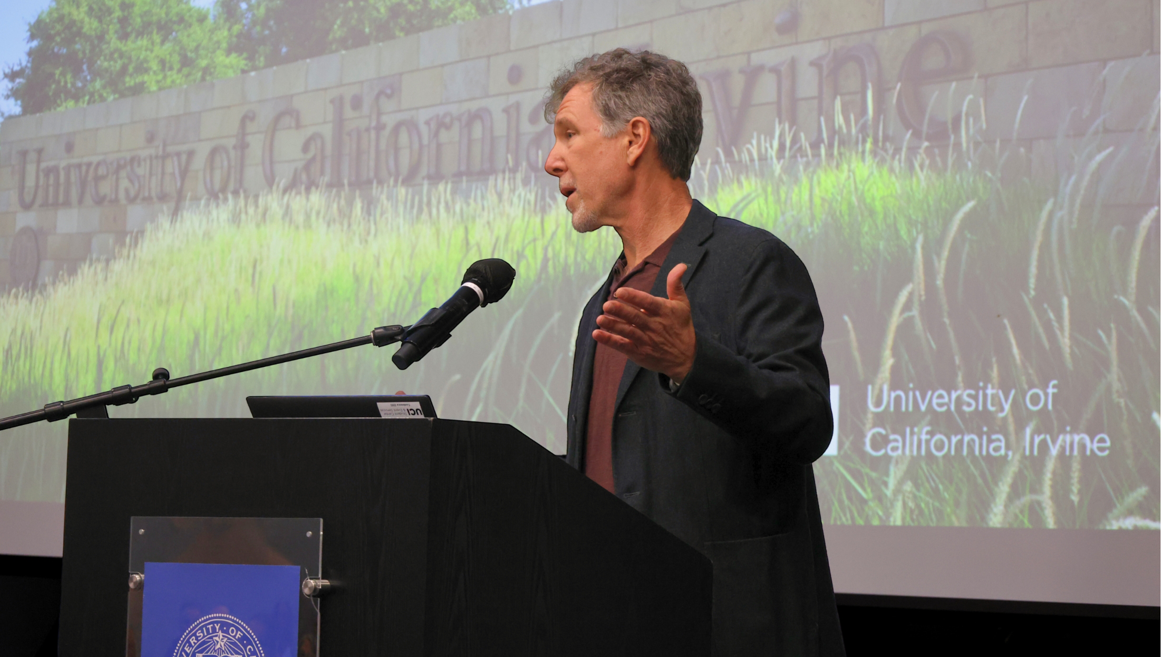 James Steintrager at the Academic Senate awards at the podium accepting his award and giving a speech.