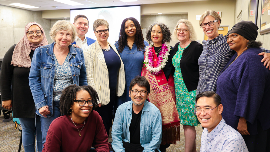 A photo smiling FMS faculty during Fatimah Tobing Rony's retirement party.