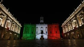 Building with colors of Italian flag projected onto it
