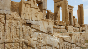 A photo of the interesting scene of the lion devouring the bull on the Apadana palace at Persepolis may symbolize the end of winter and the beginning of spring. 