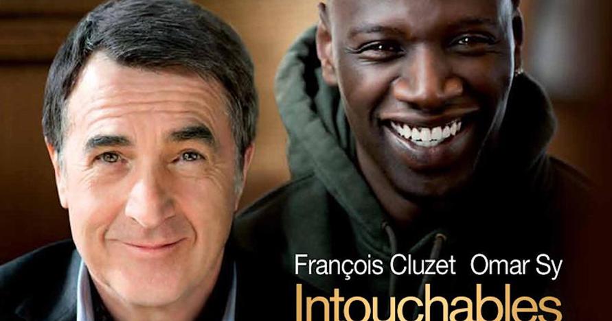 a white man and black man both smiling