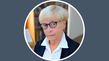 short haired woman not smiling