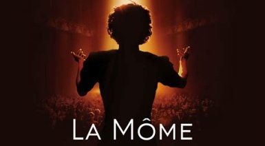 Woman's back singing to an audience