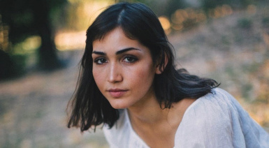 Hannah Liberman sitting outdoors