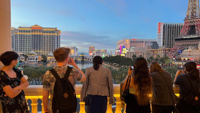 Art history students look over the Las Vegas skyline