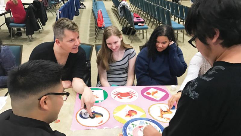 UCI faculty and students enjoy the New Year’s “Vietnamese Craps Game"