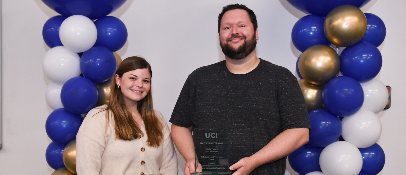 A photo of Tagert Ellis and Megan Cole recognized for teaching excellence