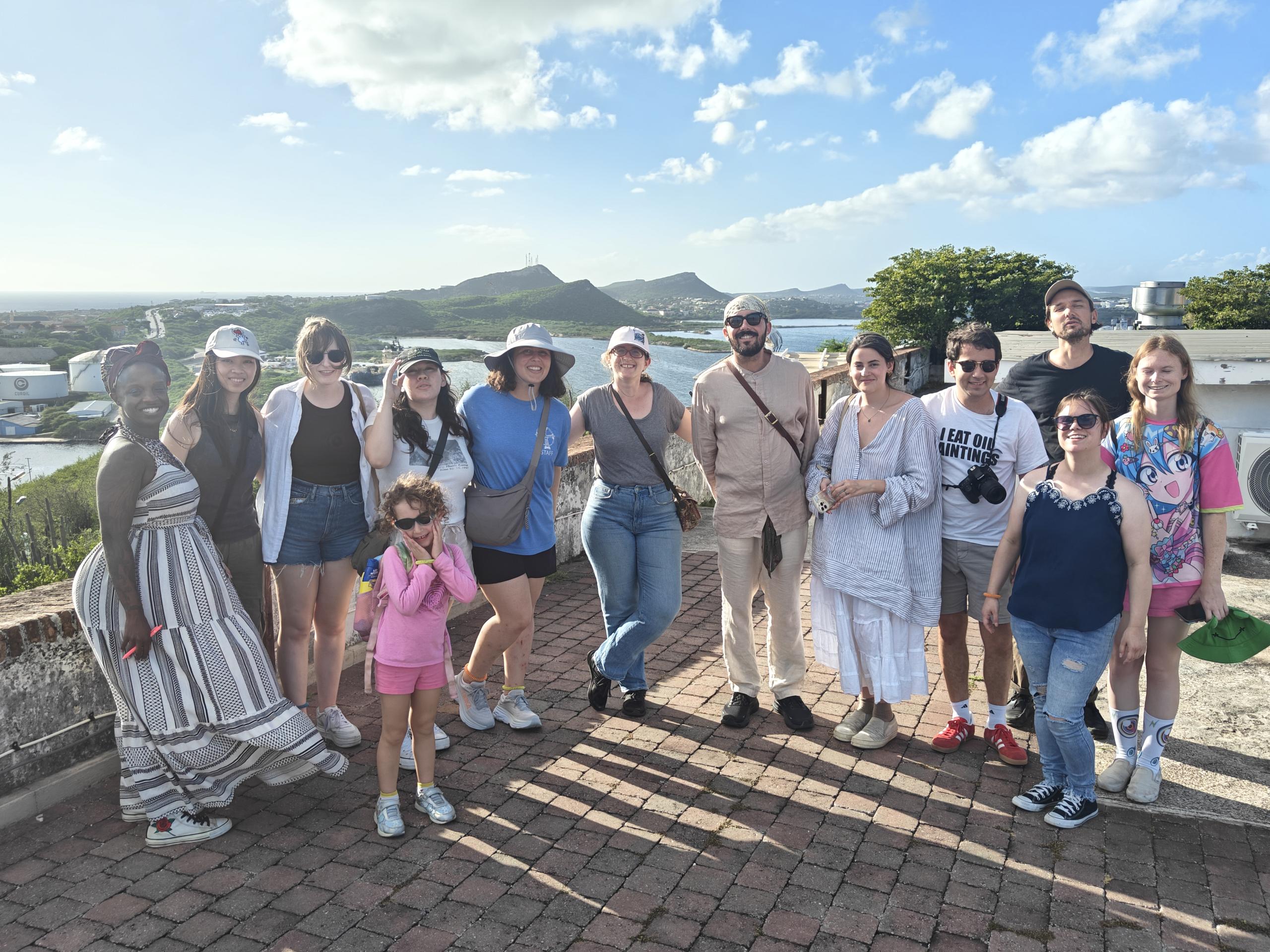 Group standing by sea in Curacao