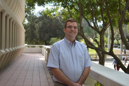 Andrew Highsmith in front of UCI's campus