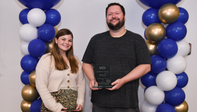 A photo of Tagert Ellis and Megan Cole after they received their awards