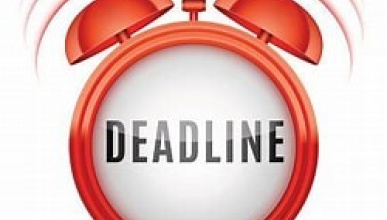 Red Clock with the word deadline in it